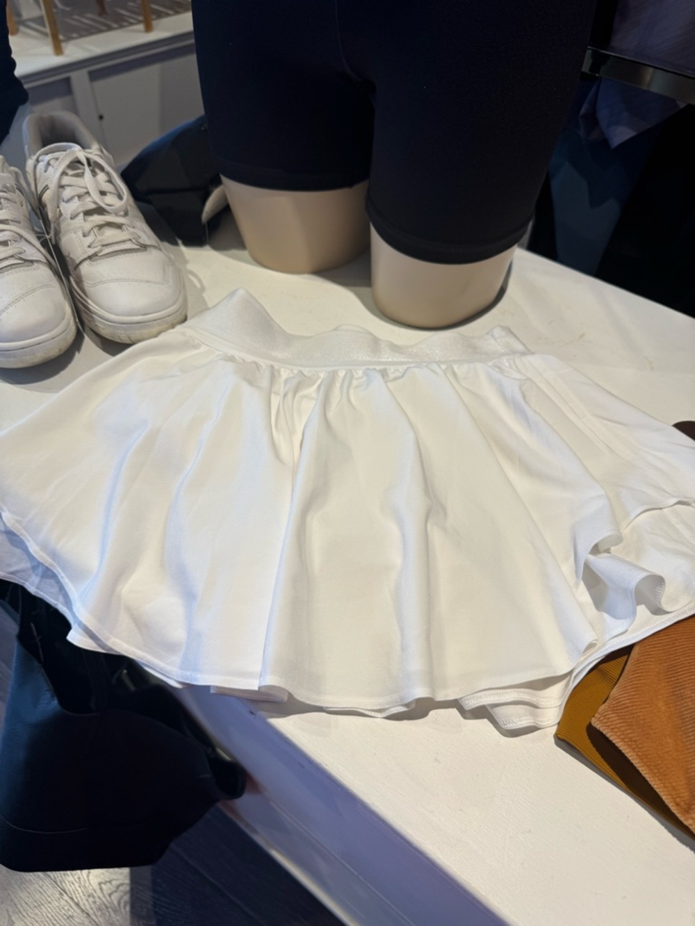Lululemon size 2 white or watermelon Tennis Style, pleated or flare variety